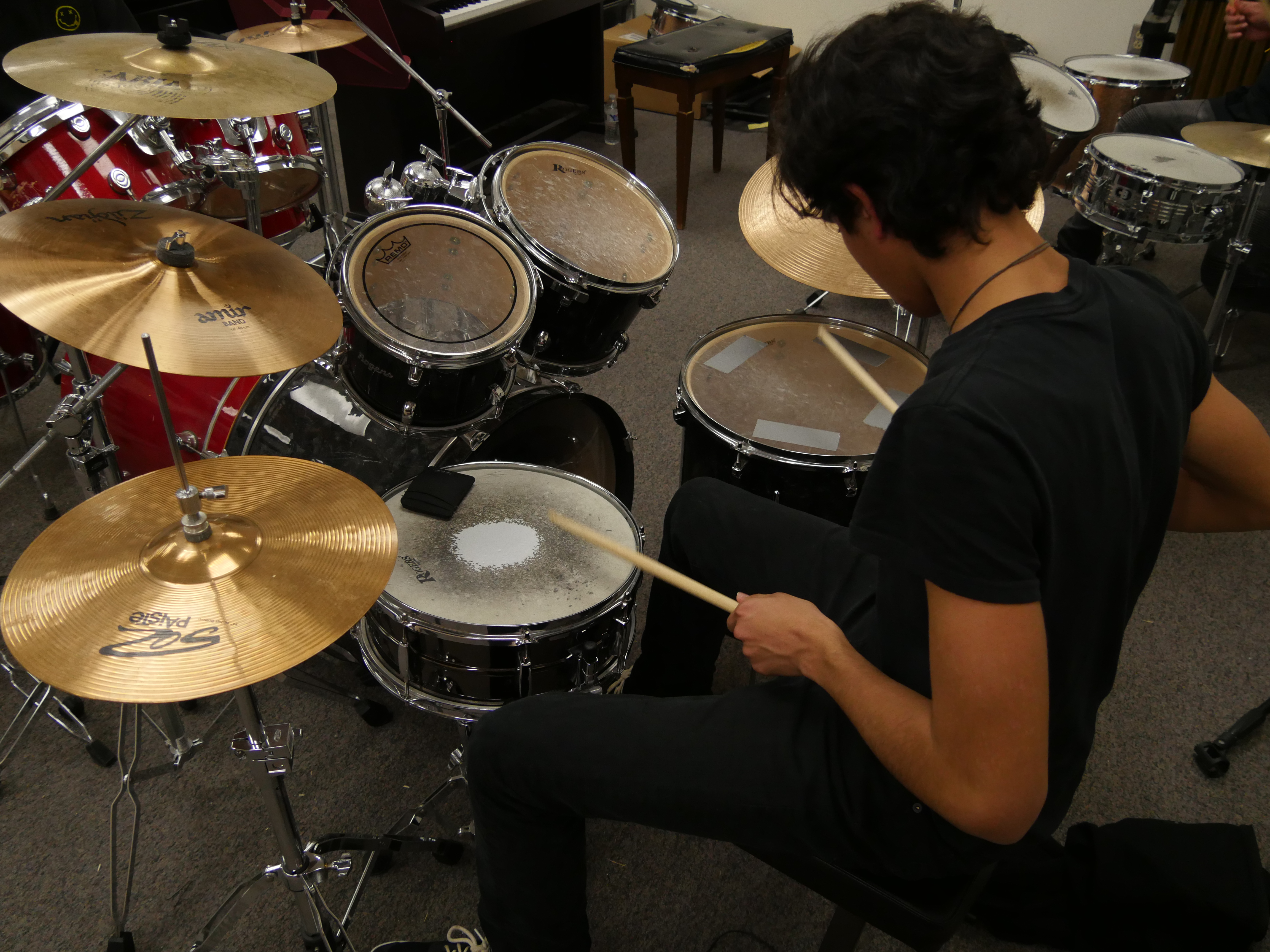 photo of a student playing drums
